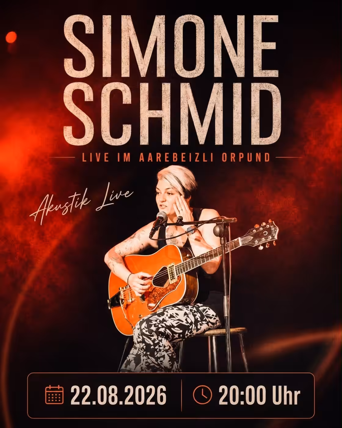 Simone Schmid Akustik-Konzert am 22.08.2026 im Aarebeizli Orpund, 20:00 Uhr. Sängerin mit Gitarre auf Bühne.